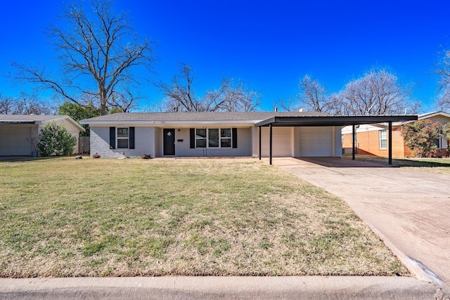 ranch-style home featuring a carport, concrete driveway, an attached garage, and a front lawn