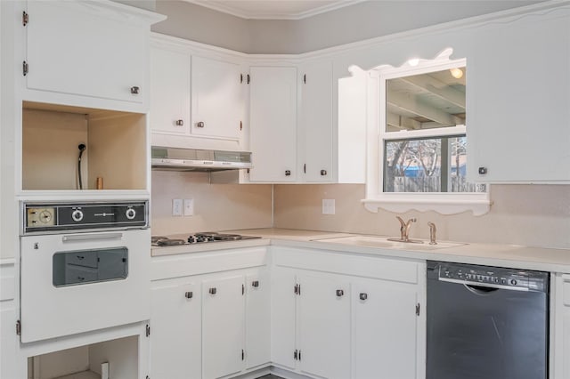 kitchen with white cabinets, a sink, wall chimney range hood, and black appliances