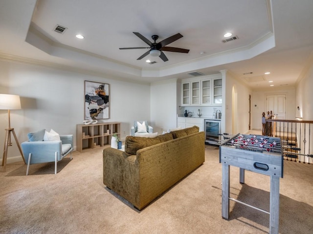 4520 Gilbert Ave, Dallas, TX 75219 - dining space with ornamental molding, a ceiling fan, baseboards, a large fireplace, and wood finished floors