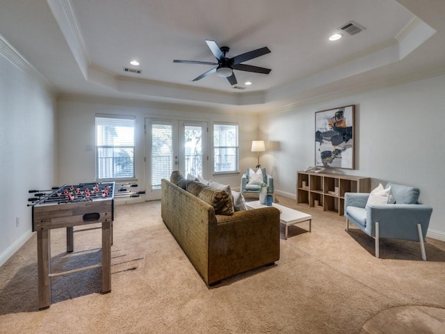 4520 Gilbert Ave, Dallas, TX 75219 - kitchen with stainless steel appliances, a sink, ornamental molding, ceiling fan, and white cabinets