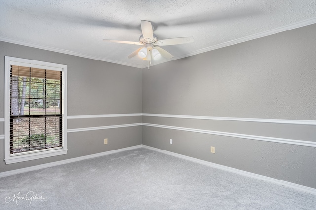 unfurnished room with ceiling fan, carpet, and crown molding