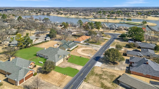418 Navajo Trl, Gainesville, TX 76240 - aerial view featuring a water view and a residential view