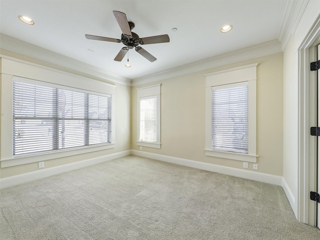 carpeted spare room featuring baseboards, ornamental molding, and recessed lighting