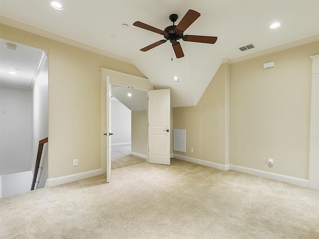 interior space with carpet, visible vents, and crown molding