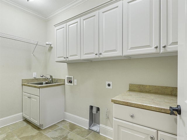 washroom with crown molding, hookup for a washing machine, cabinet space, hookup for an electric dryer, and a sink