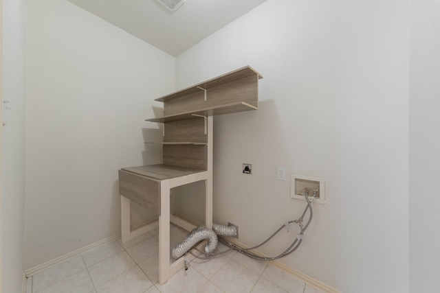 clothes washing area with laundry area, baseboards, visible vents, hookup for a washing machine, and hookup for an electric dryer