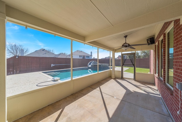 exterior space with beamed ceiling