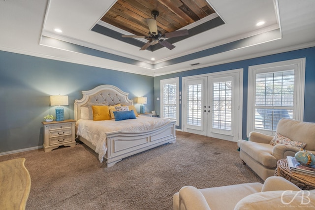 carpeted bedroom with access to outside, a tray ceiling, french doors, and crown molding