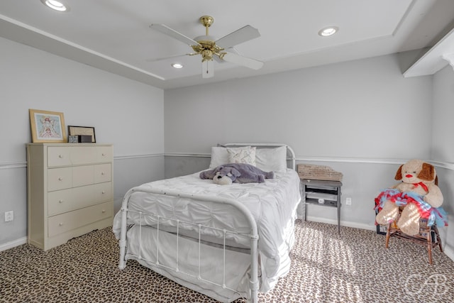 carpeted bedroom with ceiling fan, baseboards, and recessed lighting