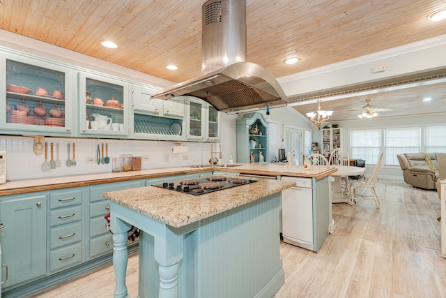 kitchen with white appliances, island range hood, wooden ceiling, open floor plan, and a peninsula