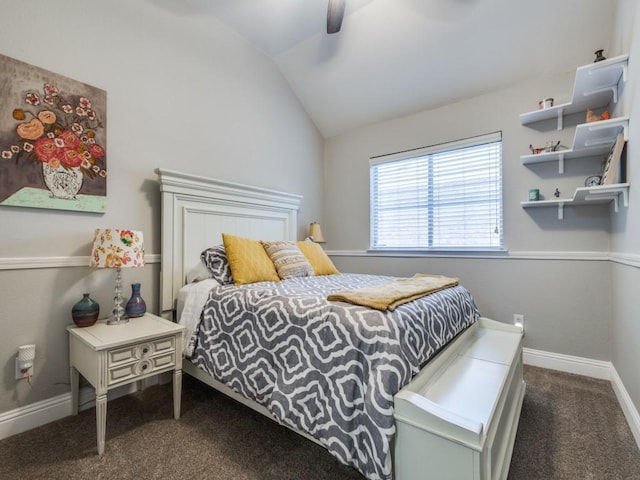 bedroom with a ceiling fan, baseboards, vaulted ceiling, and carpet flooring