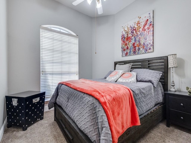 carpeted bedroom featuring a ceiling fan