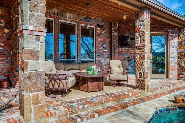 view of patio with ceiling fan and an outdoor hangout area