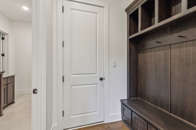 mudroom featuring baseboards