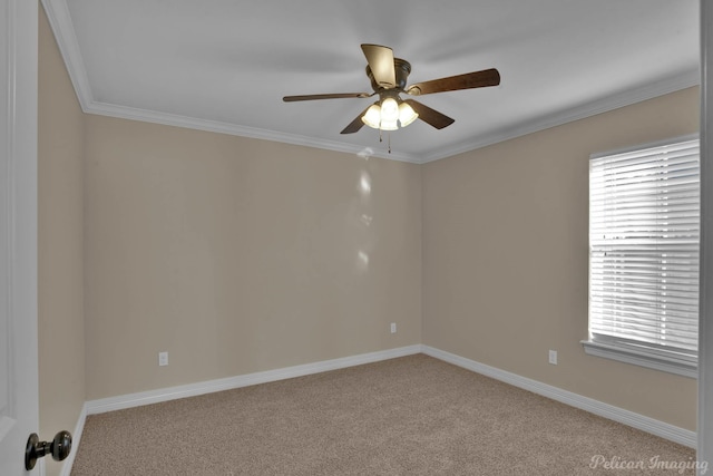 empty room featuring ornamental molding, ceiling fan, carpet floors, and baseboards