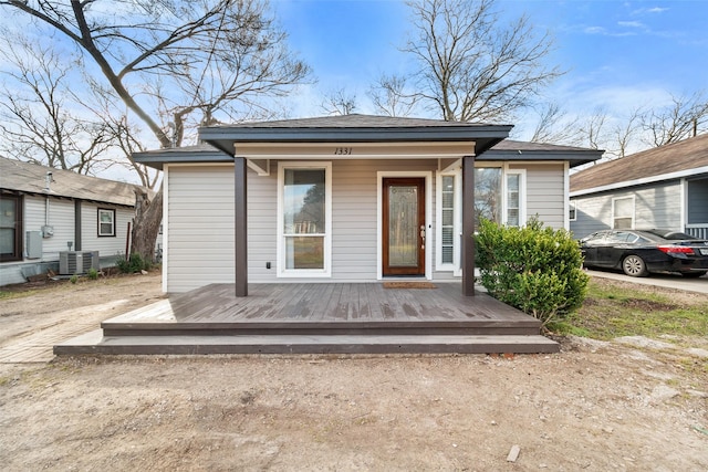 exterior space featuring central AC unit