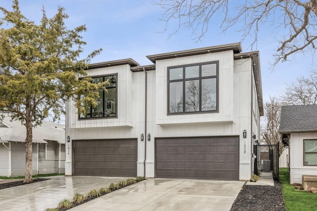 view of front of property featuring an attached garage, stairs, concrete driveway, and brick siding