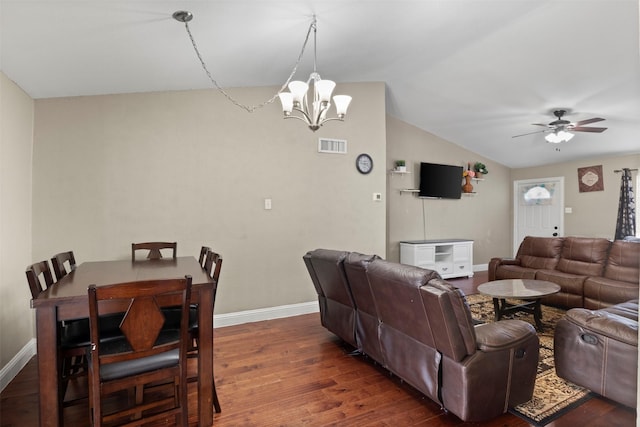 living area with visible vents, vaulted ceiling, baseboards, and wood finished floors