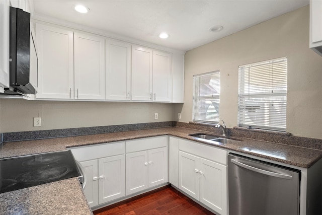 kitchen featuring dark wood-style floors, electric stove, white cabinetry, a sink, and dishwasher