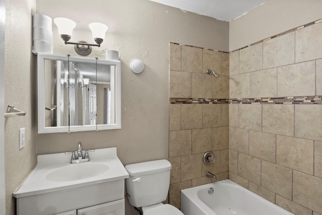 full bath featuring toilet, a textured wall, shower / tub combination, and vanity