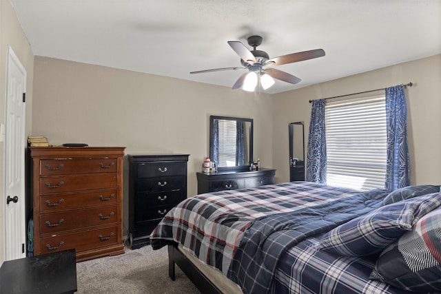 carpeted bedroom featuring a ceiling fan