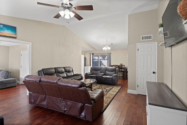 living room with lofted ceiling, ceiling fan with notable chandelier, dark wood-style flooring, visible vents, and baseboards