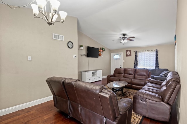 living room featuring lofted ceiling, visible vents, dark wood finished floors, and baseboards