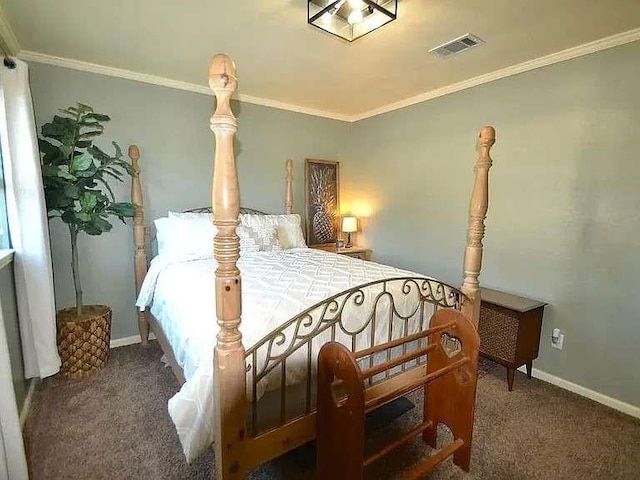 bedroom with ornamental molding, carpet flooring, visible vents, and baseboards