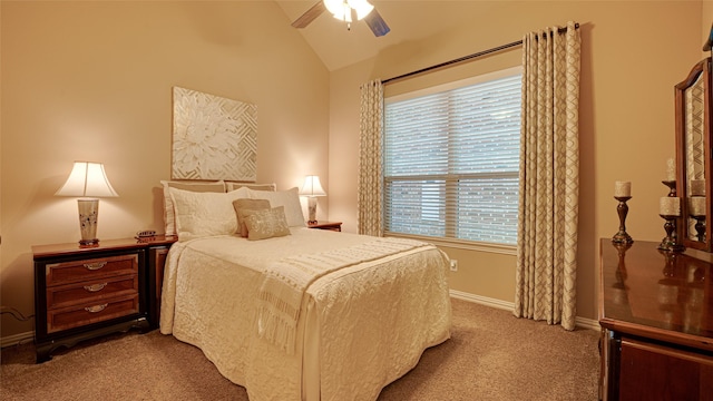 bedroom with lofted ceiling, a ceiling fan, baseboards, and carpet flooring