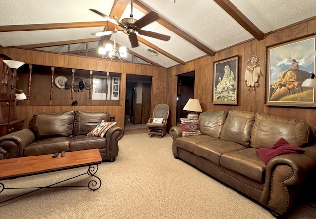 188 Walker Rd, Olney, TX 76374 - living room with wooden walls, carpet, a ceiling fan, and a textured ceiling