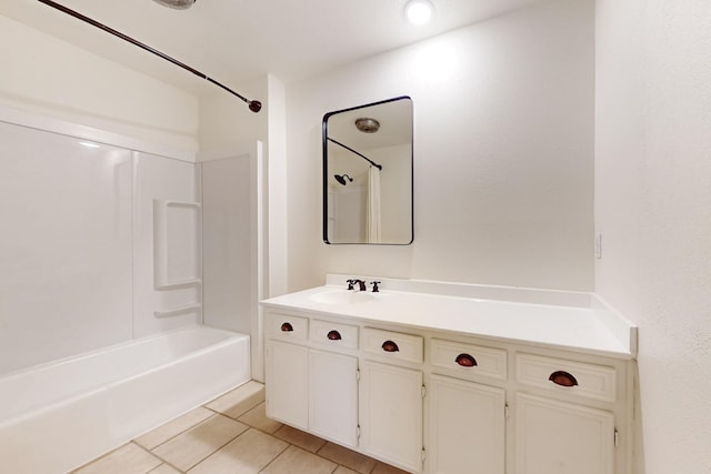 full bath with tile patterned flooring, tub / shower combination, and vanity