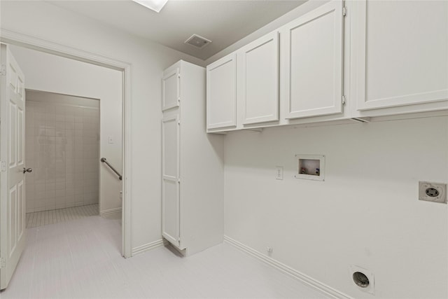 laundry area with washer hookup, visible vents, cabinet space, electric dryer hookup, and baseboards