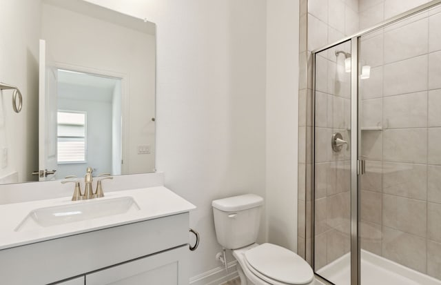 14574 Elion Ct, Pilot Point, TX 75009 - bathroom featuring a shower stall, toilet, and vanity