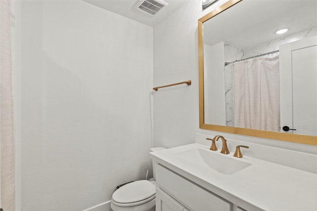 full bathroom with a shower with curtain, visible vents, vanity, and toilet