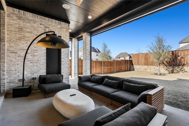 view of patio with a fenced backyard and an outdoor living space