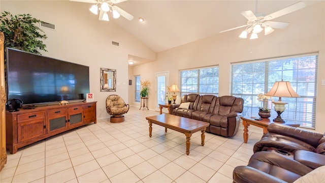 living room featuring high vaulted ceiling, visible vents, a ceiling fan, and light tile patterned flooring