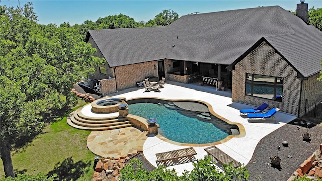 pool with a patio