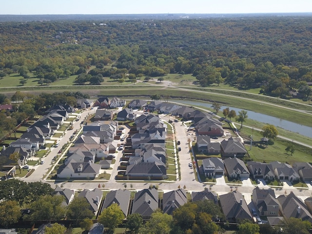 bird's eye view with a water view and a residential view