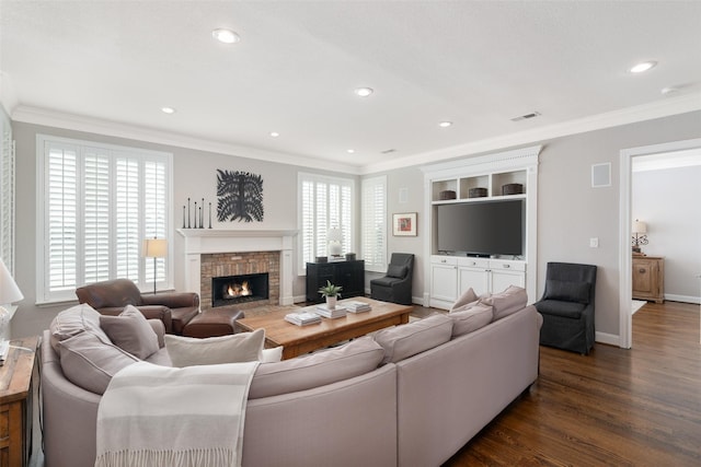 living area with dark wood-style floors, visible vents, crown molding, and baseboards