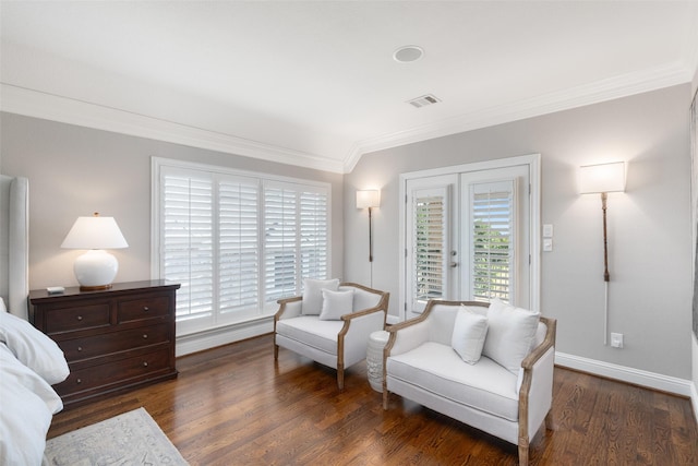 bedroom featuring baseboards, visible vents, wood finished floors, access to outside, and crown molding