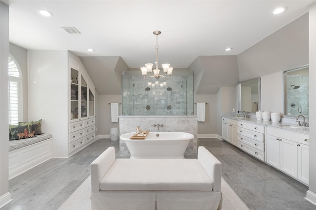 full bath with vanity, baseboards, visible vents, a stall shower, and an inviting chandelier