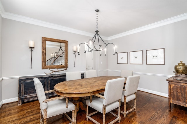 dining area featuring a chandelier, stairs, baseboards, and wood finished floors