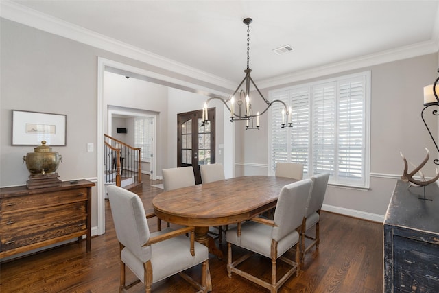 dining room featuring visible vents, ornamental molding, dark wood-style flooring, and french doors