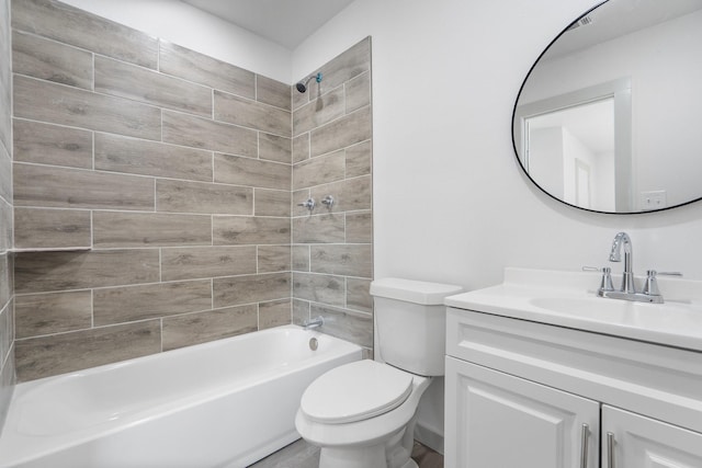 bathroom with bathing tub / shower combination, vanity, and toilet