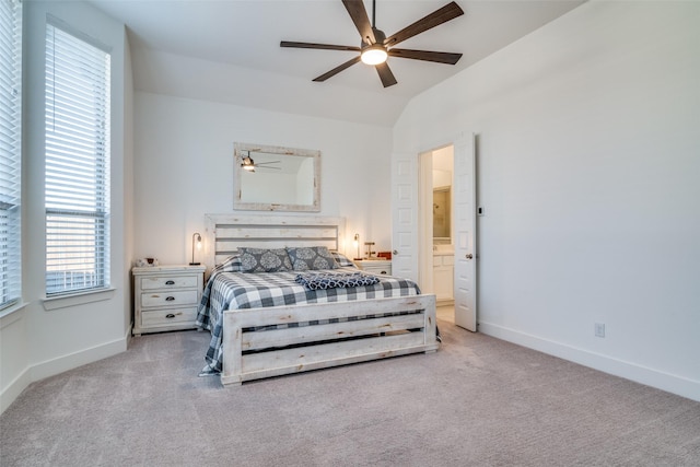 bedroom with carpet, ceiling fan, lofted ceiling, and baseboards