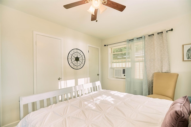 bedroom featuring a ceiling fan and cooling unit