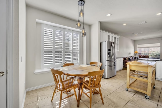 dining area featuring recessed lighting, visible vents, baseboards, and light tile patterned floors