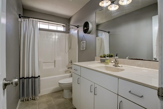 full bath with a textured wall, toilet, shower / tub combo, vanity, and tile patterned flooring