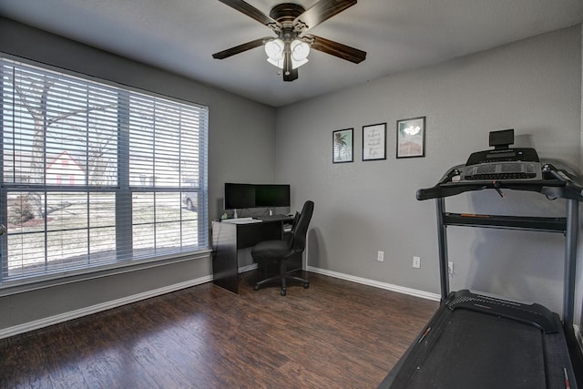 office area featuring ceiling fan, baseboards, and wood finished floors