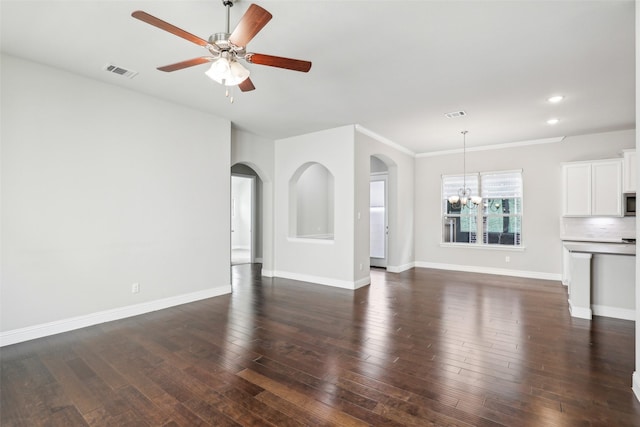 unfurnished living room with baseboards, visible vents, dark wood finished floors, and ceiling fan with notable chandelier